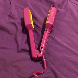 pink and gold crimper iron